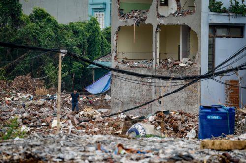 epa13017057 A man walks at a demolition site in Hanoi, Vietnam, 05 June 2026. World Environment Day is celebrated globally every year on 05 June and aims to bring awareness to environmental issues. The theme for 2026 is ‘Inspired by Nature. For Climate. For Our Future’.  EPA/LUONG THAI LINH