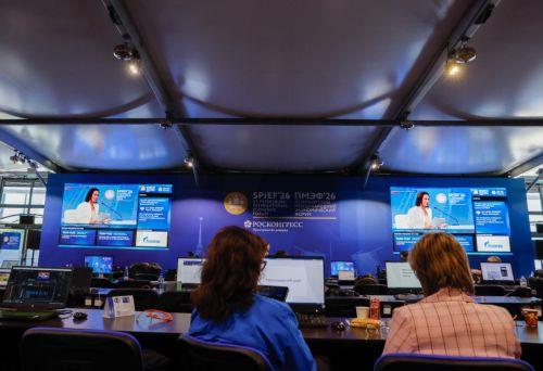 epa13017484 Journalists work in the media center during the St. Petersburg International Economic Forum (SPIEF) in St. Petersburg, Russia, 05 June 2026. The 29th St. Petersburg International Economic Forum runs from 03 to 06 June 2026.  EPA/ANATOLY MALTSEV