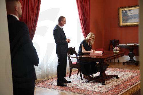 epa13017680 Latvian President Edgars Rinkevics (C) looks on as Netherlands' Queen Maxima (R) signs the guest book during their meeting in Riga, Latvia, 05 June 2026. Later Queen Maxima, the United Nations Secretary-General’s Special Advocate for Financial Health (UNSGSA), will be speaking at the opening of the 35th Annual Meeting of the Board of Governors...
