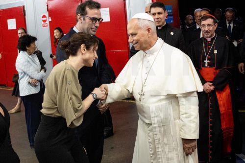 epa13023066 A handout picture made available by Madrid's Regional Government shows Pope Leo XIV (C) as he greets Madrid's Regional President Isabel Diaz Ayuso (L) and Spanish First Deputy Prime Minister and Economy Minister Carlos Cuerpo (2-L) after presiding over the meeting 'Weaving networks with the world of Culture, Education, Business and Sport', at...