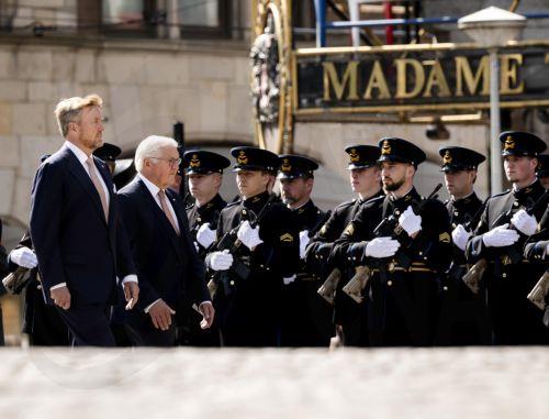 epa13025675 Dutch King Willem-Alexander (L) and German Federal President Frank-Walter Steinmeier (R) inspect the guard of honour during the reception on Dam Square, Amsterdam, The Netherlands, 09 June 2026. Steinmeier is on a three-day state visit to the Netherlands.  EPA/Remko de Waal