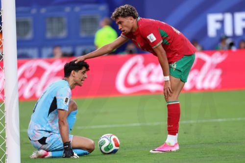 epa13035659 Neil El Aynaoui of Morocco (R) interacts with goalkeeper Yassine Bounou of Morocco during the FIFA World Cup 2026 group stage match Brazil against Morocco, in East Rutherford, New Jersey, USA, 13 June 2026.  EPA/OLGA FEDOROVA