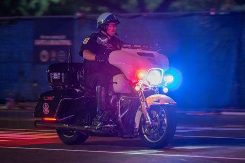 epa13035726 A motorcycle leads the motorcade of US President Donald Trump as it arrives at the White House in Washington, D.C., USA, 13 June 2026, just hours before his 80th birthday.  EPA/Matt Kaminsky