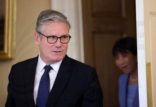 epa13036068 British Prime Minister Keir Starmer ahead of talks with Japanese Prime Minister Sanae Takaichi (R) at 10 Downing Street in London, Britain, 14 June 2026.  EPA/ANDY RAIN / POOL
