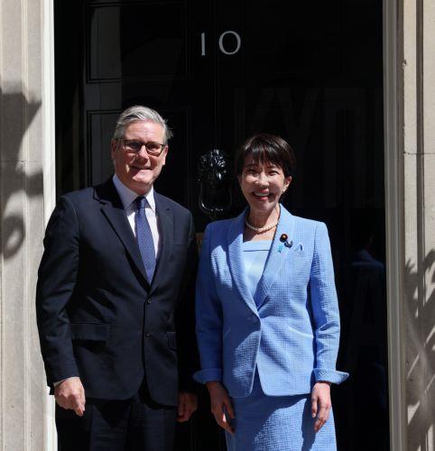 epa13036071 British Prime Minister Keir Starmer (L) welcomes Japanese Prime Minister Sanae Takaichi to 10 Downing Street in London, Britain, 14 June 2026.  EPA/ANDY RAIN