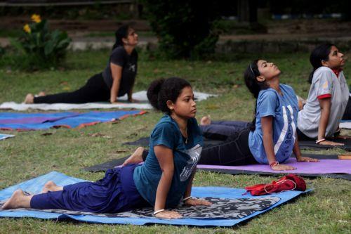 epa13040435 People attend a mass yoga session ahead of the 12th International Yoga Day in Kolkata, India, 16 June 2026. The 'International Day of Yoga' is celebrated annually on 21 June and has been recognized worldwide since 2015. The United Nations declared yoga a practice of physical, mental, and spiritual exercise originating in ancient India. This...