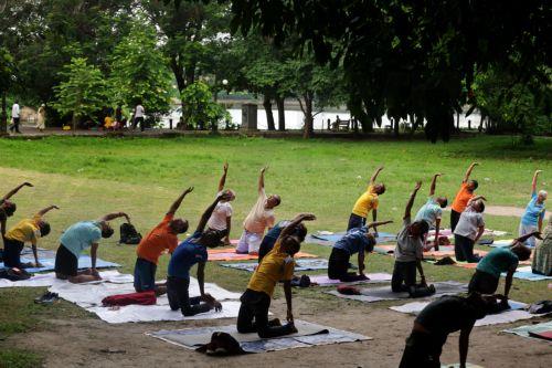 epa13040441 People attend a mass yoga session ahead of the 12th International Yoga Day in Kolkata, India, 16 June 2026. The 'International Day of Yoga' is celebrated annually on 21 June and has been recognized worldwide since 2015. The United Nations declared yoga a practice of physical, mental, and spiritual exercise originating in ancient India. This...