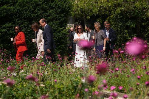 epa13040966 (L-R) Kenia's Rachel Kimetto, Germany's Charlotte Merz, Germany's Heiko von der Leyen, Britain's Victoria Starmer, and Canada's Diana Fox Carney walk through a park during a spouses program on the sidelines of the G7 summit in Yvoire, France, 16 June 2026. The 52nd G7 Summit takes place in Evian-les-Bains from 15 to 17 June 2026.  EPA/Christophe...