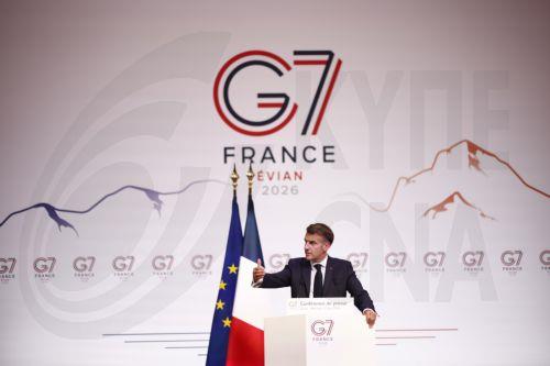 epa13044472 French President Emmanuel Macron attends a press conference at the Hotel Royal during the G7 summit in Evian-les-Bains, France, 17 June 2026. The 52nd G7 Summit takes place in Evian-les-Bains from 15 to 17 June 2026.  EPA/YOAN VALAT