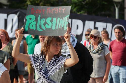 epa13044597 Swedish climate activist Greta Thunberg (C) joins Freedom Flotilla activists and supporters during a demonstration in support of Gaza near the European Council headquarters in Brussels, Belgium, 17 June 2026. The protest took place a day ahead of a meeting of European Union leaders in Brussels and follows the interception by Israeli forces of...