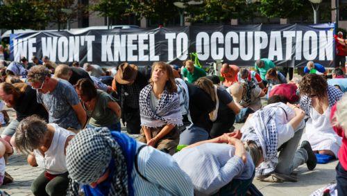 epa13044598 Swedish climate activist Greta Thunberg (C) joins Freedom Flotilla activists and supporters during a demonstration in support of Gaza near the European Council headquarters in Brussels, Belgium, 17 June 2026. The protest took place a day ahead of a meeting of European Union leaders in Brussels and follows the interception by Israeli forces of...