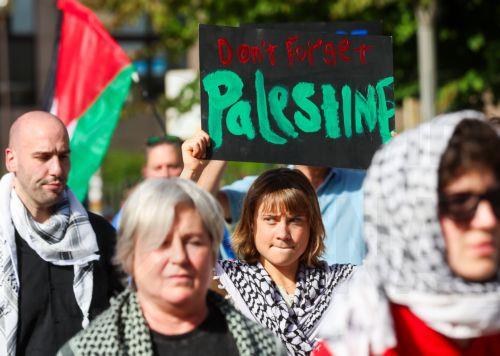 epa13044600 Swedish climate activist Greta Thunberg (C) joins Freedom Flotilla activists and supporters during a demonstration in support of Gaza near the European Council headquarters in Brussels, Belgium, 17 June 2026. The protest took place a day ahead of a meeting of European Union leaders in Brussels and follows the interception by Israeli forces of...