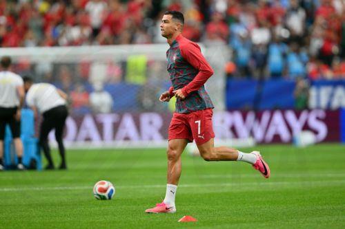 epa13044616 Cristiano Ronaldo of Portugal warms up before the FIFA World Cup 2026 group stage match Portugal against Democratic Republic of Congo, in Houston, USA, 17 June 2026.  EPA/SAM WASSON