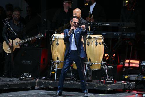 epa13047950 Musician Marc Anthony performs during the opening ceremony of the Obama Presidential Center in Chicago, Illinois, USA, 18 June 2026. The 19-acre campus includes a museum, a branch of the Chicago Public Library, an athletic center, a cafe, a restaurant, a sledding hill and public park space.  EPA/VICTOR HILITSKI