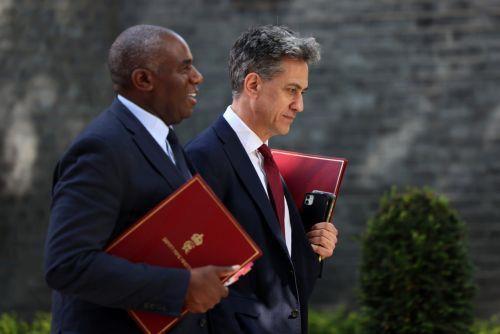 epa13057955 British Deputy Prime Minister, Lord Chancellor and Secretary of State for Justice David Lammy (L) with British Secretary of State for Energy Security and Net Zero Ed Miliband depart 10 Downing Street following a Cabinet meeting in London, Britain, 23 June 2026.  EPA/ANDY RAIN