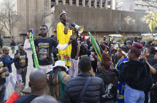 epa13066109 Members of the Tsonga tribe gather as they protest against the nation wide anti-immigrant movement that is planning a national shutdown on 30 June in Johannesburg, South Africa, 26 June 2026.  The march was organized in response to the killing of Nhlamulo Sambo in Mossel Bay (Western Cape), where he was reportedly targeted during anti-migrant...