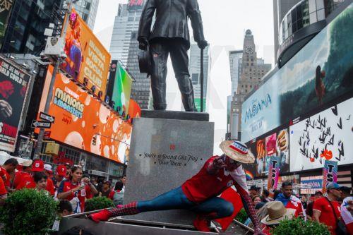 epa13067835 A Panama soccer fan dressed in a Spiderman outfit poses in Times Square one day before their team plays against England, in New York, New York USA, 26 June 2026.  EPA/OLGA FEDOROVA