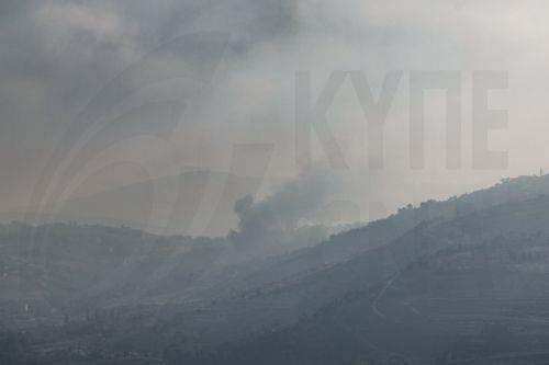 epa13070684 Smoke rises from the southern Lebanese town of Khiam, as seen from the Israeli side of the border in the Upper Galilee, northern Israel, 28 June 2026, amid an Israel-Lebanon ceasefire.  EPA/ATEF SAFADI