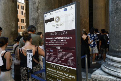 epa13077297 Tourists queue at the ticket office for entry to the Pantheon, in Rome,  Italy, 01 July 2026. The price increase for Pantheon admission for non-resident visitors takes effect from 01 July. Rome residents will continue to enter free of charge.  EPA/ANGELO CARCONI
