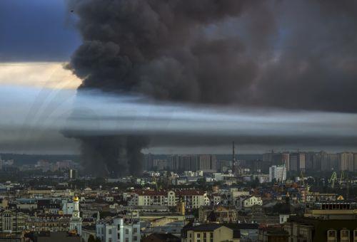 epaselect epa13079796 Smoke rises above Kyiv, Ukraine, 02 July 2026, after a massive combined Russian attack, amid the Russian invasion. According to the State Emergency Service of Ukraine, at least 17 people were killed and more than 90 injured after the overnight attack on Kyiv. The Ukrainian Air Force said Russia launched about 500 drones and more than...