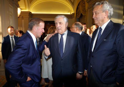 epa13081411 Italy's Minister for Foreign Affairs Antonio Tajani (C) and US Ambassador to Italy and San Marino Tilman Fertitta (L) attend an event at Villa Taverna, the US ambassador's residence, to celebrate the upcoming US Independence Day, in Rome, Italy, 02 July 2026.  EPA/GIUSEPPE LAMI