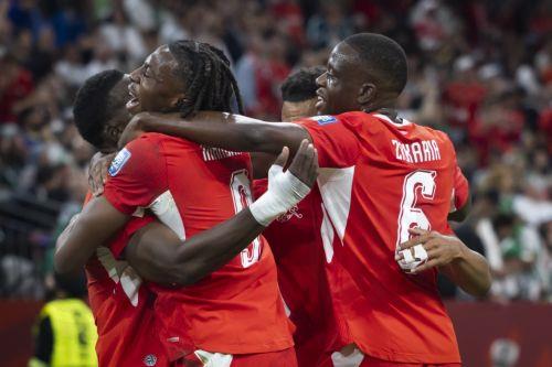 epa13082396 (L-R) Switzerland's Breel Embolo, Johan Manzambi, Dan Ndoye and Denis Zakaria celebrate after scoring their side's first goal during the World Cup round of 32 soccer match between Switzerland and Algeria at the BC Place stadium in Vancouver, Canada, 02 July 2026.  EPA/PETER KLAUNZER EDITORIAL USE ONLY