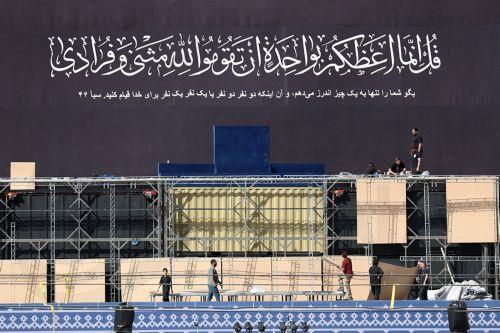 epa13082425 Iranian workers set a stand for the coffin of late Iranian Supreme Leader Ayatollah Ali Khamenei at the Imam Khomeini Mosalla Grand Mosque, ahead of farewell and funeral ceremonies, in Tehran, Iran, 03 July 2026. Iran is set to hold a multi-day state funeral from 04 to 09 July for Khamenei, who was killed in a joint US and Israeli airstrike on...