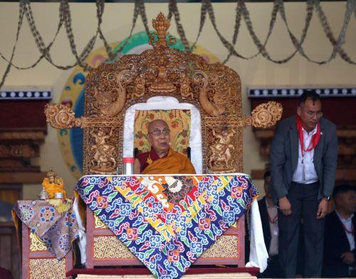 epa13090559 His Holiness the 14th Dalai Lama, Tenzin Gyatso (C), blesses Buddhist devotees at the venue to celebrate his 91st birthday during a public ceremony at the Jivetsal Teaching Ground in Choglamsar, near Leh, Ladakh, India, 06 July 2026. The birthday celebrations, jointly organised by the Ladakh Buddhist Association, the All Ladakh Gonpa...