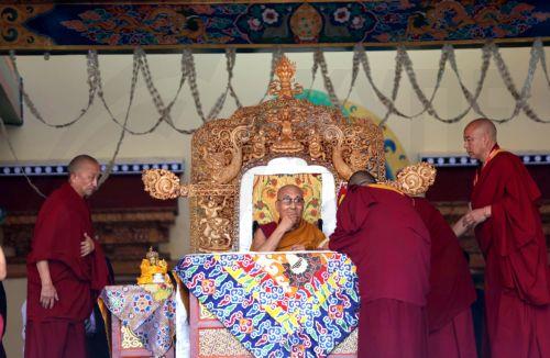 epa13090563 His Holiness the 14th Dalai Lama, Tenzin Gyatso (C), blesses Buddhist devotees at the venue to celebrate his 91st birthday during a public ceremony at the Jivetsal Teaching Ground in Choglamsar, near Leh, Ladakh, India, 06 July 2026. The birthday celebrations, jointly organised by the Ladakh Buddhist Association, the All Ladakh Gonpa...