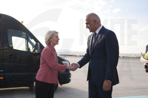 epa13092285 European Commission President Ursula von der Leyen (L) is welcomed by Turkish Minister of Culture and Tourism, Mehmet Nuri Ersoy (R), at Esenboga Airport ahead of the 36th NATO Heads of State and Government Summit in Ankara, Turkiye, 06 July 2026. The summit will take place on 07–08 July, focusing on strengthening defense industrial production...