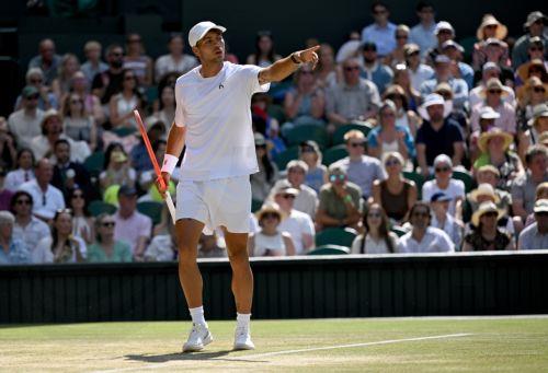 epa13098294 Flavio Cobolli of Italy gestures during his Men's Singles quarter-final match against Arthur Fery of Britain at the Wimbledon Championships in London, Britain, 08 July 2026.  EPA/DANIEL HAMBURY