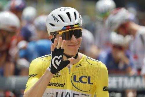 epa13102325 Yellow Jersey overall leader Slovenian cyclist Tadej Pogacar of UAE Team Emirates XRG waves ahead of Stage 7 of the Tour de France, a 175.1 km route from Hagetmau to Bordeaux, France, 10 July 2026.  EPA/GUILLAUME HORCAJUELO