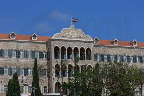 epa13108082 The Lebanese national flag flies at half-mast at the Government Palace in Beirut, Lebanon, 13 July 2026. Lebanese Prime Minister Nawaf Salam issued a memorandum declaring official mourning following the death of former Emir of Qatar Sheikh Hamad bin Khalifa Al Thani, who died 12 July 2026 at the age of 74, according to Qatar's Amiri Diwan. ...