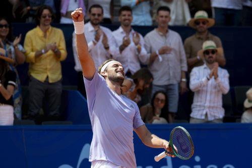 epa13120238 Stefanos Tsitsipas of Greece celebrates his victory against Raphael Collignon of Belgium after winning the men's final match at the Swiss Open tennis tournament in Gstaad, Switzerland, 19 July 2026.  EPA/ANTHONY ANEX