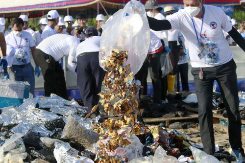 epa13124118 Cambodian officials prepare to burn seized illegal drugs during a drug destruction event in Kandal province, Cambodia, 21 July 2026. The Cambodian National Authority for Combating Drugs destroyed nearly five tons of illegal drug substance ingredients in an effort to fight against drug production, distribution and drug trafficking.  EPA/KITH SEREY