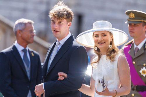 epa13124360 Prince Emmanuel and Princess Elisabeth of Belgium greet people outside the St. Michael & St. Gudula Cathedral after the Te Deum mass during Belgium's National Day celebrations in Brussels, Belgium, 21 July 2026.  EPA/OLIVIER MATTHYS