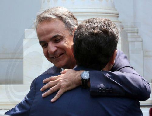 epa13126122 Greek Prime Minister Kyriakos Mitsotakis (L) greets Portuguese Prime Minister Luis Montenegro (R) during the latter's visit to the Maximos Mansion in Athens, Greece, 22 July 2026. Montenegro is in Athens for a bilateral working meeting with his Greek counterpart.  EPA/ORESTIS PANAGIOTOU