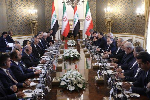 epa13128010 A handout picture made available by the Iranian presidential office shows Iranian president Masoud Pezeshkian (C-R) and Iraqi Prime minister Ali Al-Zaidi (C-L) during a meeting in Tehran, Iran, 23 July 2026. The Iraqi prime minister is on an official diplomatic trip to Tehran to hold talks with senior Iranian officials.  EPA/IRANIAN PRESIDENTIAL...