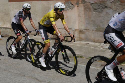 epa13128016 Slovenian cyclist Tadej Pogacar (R) of UAE Team Emirates XRG in action during Stage 18 of the Tour de France, a 185.2 km route from Voiron to Orcieres-Merlette, France, 23 July 2026.  EPA/YOAN VALAT