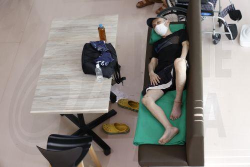 epa13141140 An earthquake affected person shelters in Matsubashi-higashi Emergency Control Center, following a powerful earthquake in Uki, Kumamoto Prefecture, southwestern Japan, 30 July 2026. Rescue operations continue across Kumamoto Prefecture, where more than a dozen people have died and several others were injured following a 7.1-magnitude earthquake...