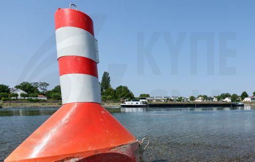 epa13141322 A buoy used to mark the waterway on the Rhine river is sitting on dry land in Speyer, Germany, 30 July 2026. Due to a severe heatwave and prolonged dry weather, water levels on the Rhine River in Germany have plunged. The German Weather Service (DWD) expects the heat wave to peak in the coming days, with temperatures between 34 and 38 degrees...
