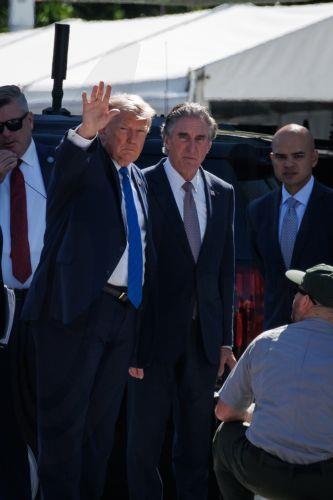epa13144159 US President Donald Trump (C-L) inspects some of the restoration work being done on the White House with US Secretary of the Interior Doug Burgum (C-R) before departing for Camp David, in Washington, D.C., USA, 31 July 2026. Trump is holding a cabinet meeting at Camp David before heading to his private golf course in Bedminster, New Jersey where...