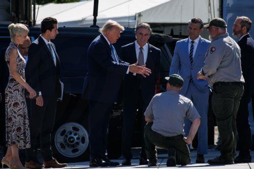 epa13144160 US President Donald Trump (C-L) inspects some of the restoration work being done on the White House with US Secretary of the Interior Doug Burgum (C-R) before departing for Camp David, in Washington, D.C., USA, 31 July 2026. Trump is holding a cabinet meeting at Camp David before heading to his private golf course in Bedminster, New Jersey where...