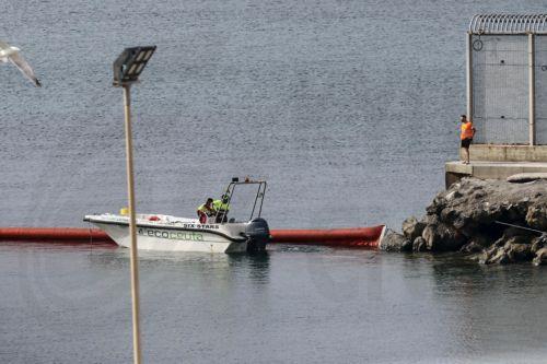 epa13148245 Work continues on the installation of a floating buoy marking the jurisdictional waters off Tarajal Beach in Ceuta and separating them from Morocco in Ceuta, Spain, 03 August 2026. Surveillance along the Tarajal border, both at sea and on land, as well as new containment measures in the area, including the installation of a barrier in the sea,...