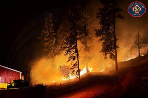 epa13148328 A handout photo made available by the Spokane Valley Fire Department shows the Fairview Fire northeast of Spokane, Washington, USA, 02 August 2026 (released on 03 August 2026). Wildfires in Spokane County have displaced thousands of residents and destroyed hundreds of homes and buildings.  EPA/SPOKANE VALLEY FIRE DEPARTMENT HANDOUT   HANDOUT...