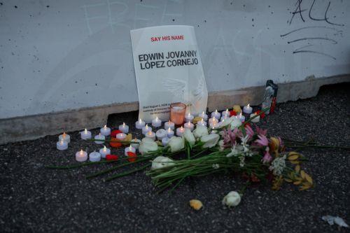 epa13149174 Flowers and candles are placed outside the Delaney Hall Immigration Detention Facility during a vigil for Edwin Jovanny Lopez Cornejo, in Newark, New Jersey, USA, 03 August 2026. At least 54 people have died in ICE custody since the start of the second Trump administration.  EPA/OLGA FEDOROVA
