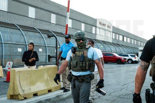 epa13149176 An Immigration and Customs Enforcement (ICE) agent is seen with a can of pepper spray at the Delaney Hall Immigration Detention Facility during a vigil and protest for Edwin Jovanny Lopez Cornejo, in Newark, New Jersey, USA, 03 August 2026. At least 54 people have died in ICE custody since the start of the second Trump administration.  EPA/OLGA...