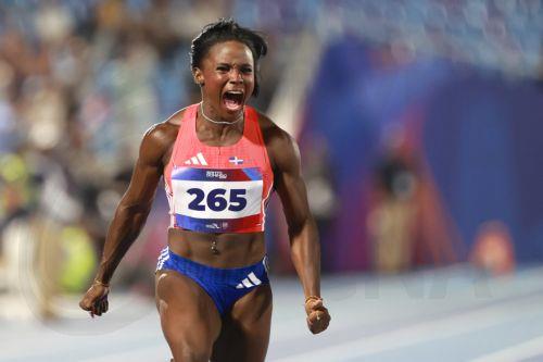epa13149190 Liranyi Alonso of the Dominican Republic celebrates after winning the Women's 100 m final during the XXV Central American and Caribbean Games Santo Domingo 2026, in Santo Domingo, Dominican Republic, 03 August 2026.  EPA/ORLANDO BARRIA
