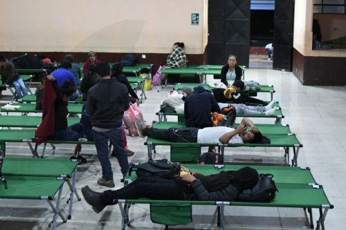 epa13149909 People rest after being evacuated in Alotenango, southwest of Guatemala City, Guatemala, 04 August 2026. The National Coordinator for Disaster Reduction (CONRED) reported that at least two villages on the slopes of the Fuego volcano, El Porvenir and Las Lajitas, were evacuated.  EPA/ALEX CRUZ