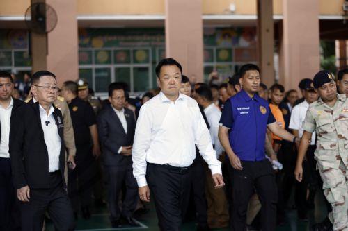 epa13155280 Thai Prime Minister Anutin Charnvirakul (C) and Minister of Education Prasert Jantararuangtong (L) arrive to inspect the site following a school shooting at Debsirin Nonthaburi School in Bang Kruai district, Nonthaburi province, Thailand, 07 August 2026. Eight people were killed and 22 others injured after a student opened fire inside the school...